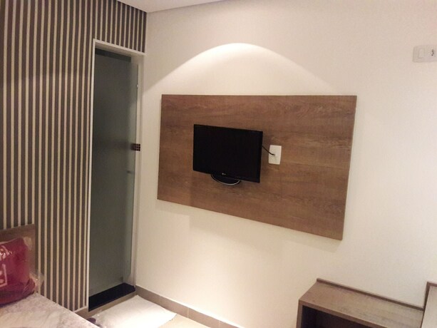 Imagen de la habitación del Namorata Expo Inn. Foto 11