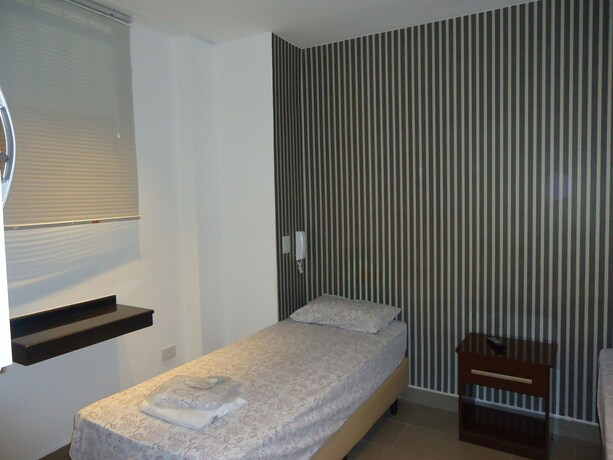Imagen de la habitación del Namorata Expo Inn. Foto 15