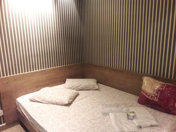 Imagen de la habitación del Namorata Expo Inn. Foto 17