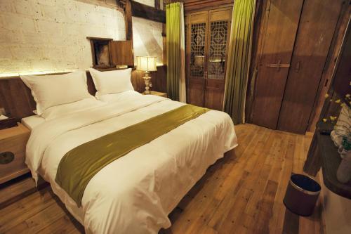 Imagen de la habitación del Nan Xiang Zi Guesthouse. Foto 9