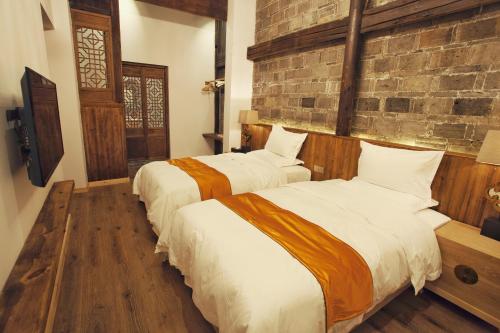 Imagen de la habitación del Nan Xiang Zi Guesthouse. Foto 10