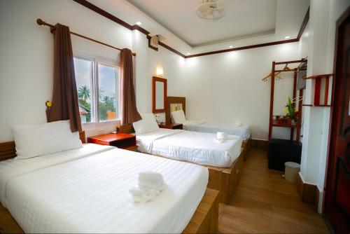 Imagen de la habitación del Nana Backpacker Hostel, Vientiane. Foto 13