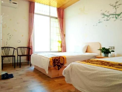 Imagen de la habitación del Nanjing Leisure Guesthouse. Foto 8