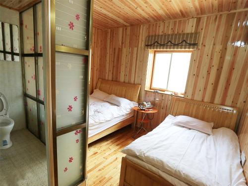 Imagen de la habitación del Nanjing Shuiyunyao Wang Xi Inn. Foto 9