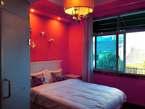 Imagen de la habitación del Nanshan South Theme Inn. Foto 5