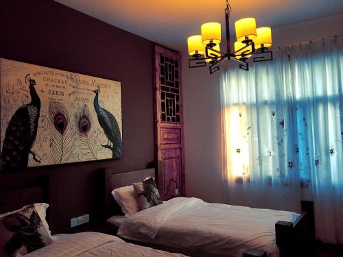 Imagen de la habitación del Nanshan South Theme Inn. Foto 7