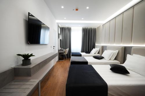 Imagen de la habitación del Naos Luxury Hotel. Foto 15