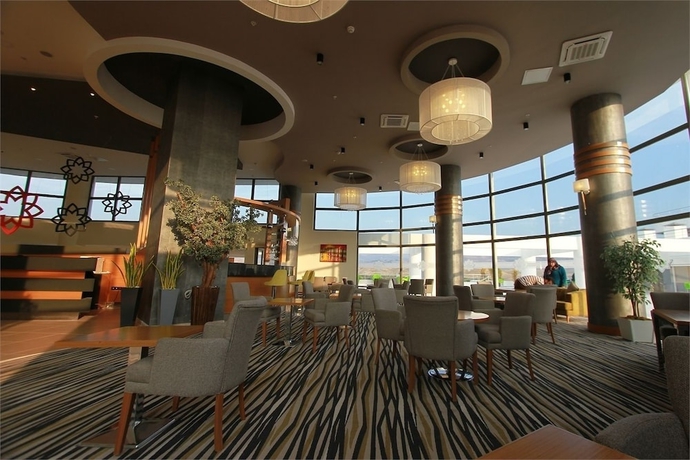 Imagen del bar/restaurante del Naskon Sapphire Resort Thermal and Spa. Foto 3