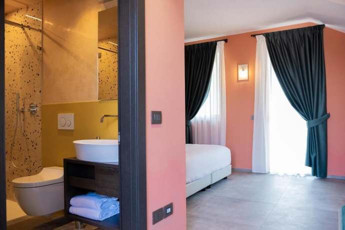 Imagen de la habitación del Natiia Relais. Foto 10
