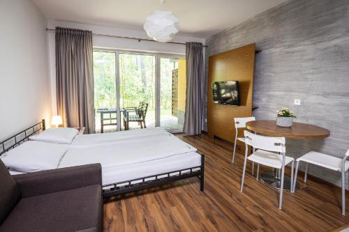 Imagen de la habitación del Natura Resort. Foto 17