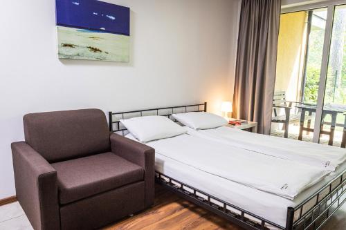 Imagen de la habitación del Natura Resort. Foto 18