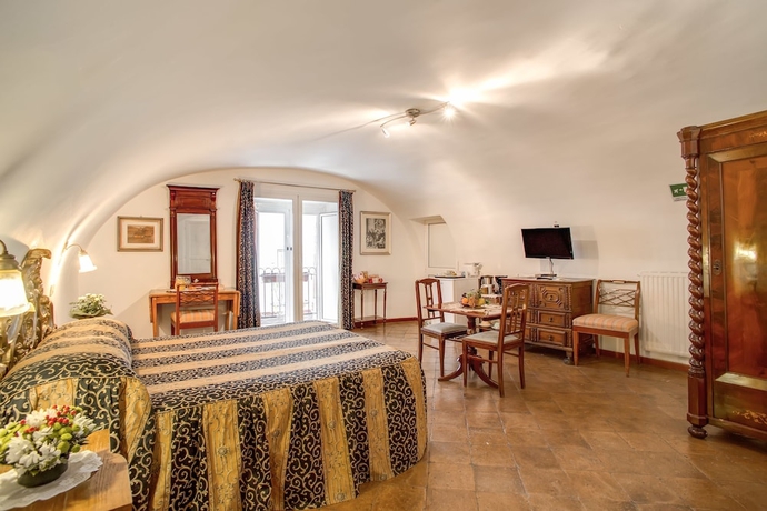 Imagen de la habitación del Navona Gallery Suites. Foto 2