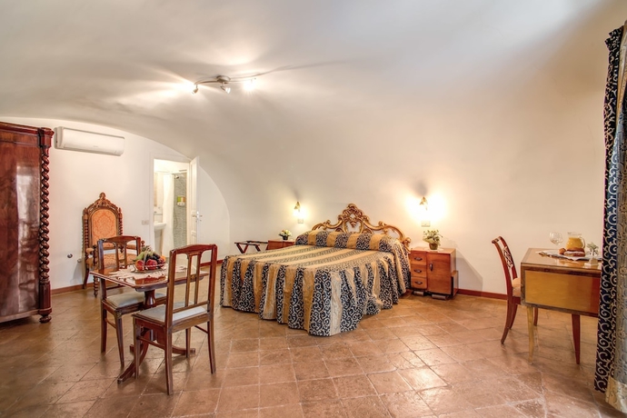 Imagen de la habitación del Navona Gallery Suites. Foto 3