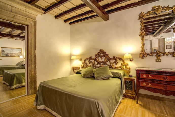 Imagen de la habitación del Navona Gallery Suites. Foto 5