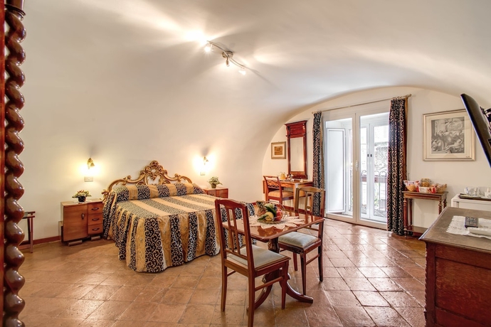 Imagen de la habitación del Navona Gallery Suites. Foto 8