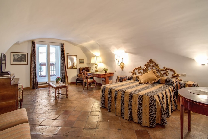 Imagen de la habitación del Navona Gallery Suites. Foto 9