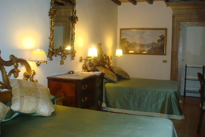 Imagen de la habitación del Navona Gallery Suites. Foto 11