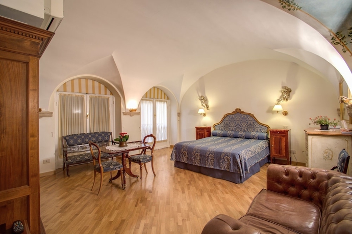 Imagen de la habitación del Navona Gallery Suites. Foto 16