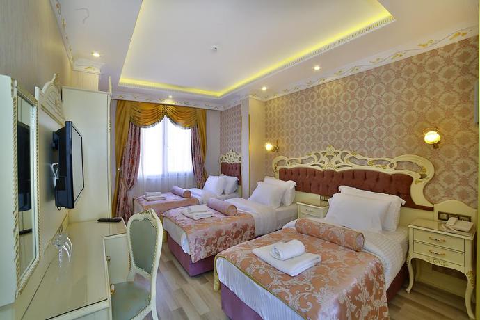 Imagen de la habitación del Nayla Palace Hotel. Foto 6