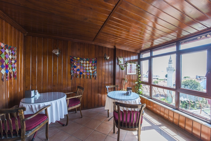 Imagen del bar/restaurante del Naz Wooden House Inn - Byzantine House. Foto 4