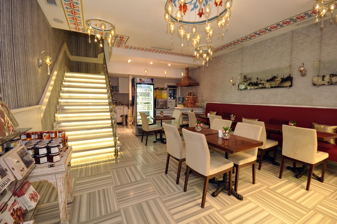 Imagen del bar/restaurante del Nea Suites Old City. Foto 4