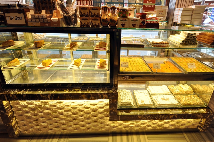 Imagen del bar/restaurante del Nea Suites Old City. Foto 5