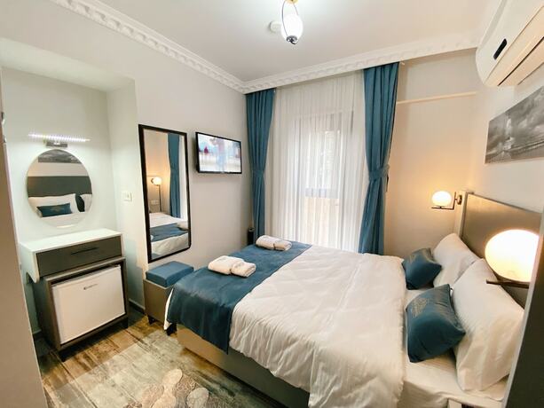 Imagen de la habitación del Nefis Hotel City. Foto 11