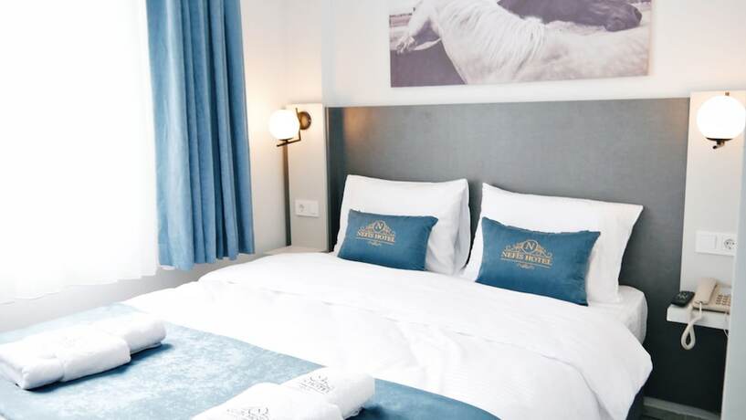 Imagen de la habitación del Nefis Hotel City. Foto 12