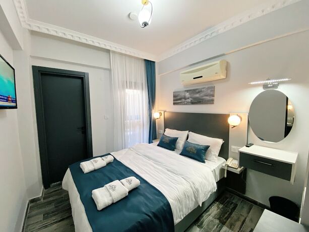 Imagen de la habitación del Nefis Hotel City. Foto 15
