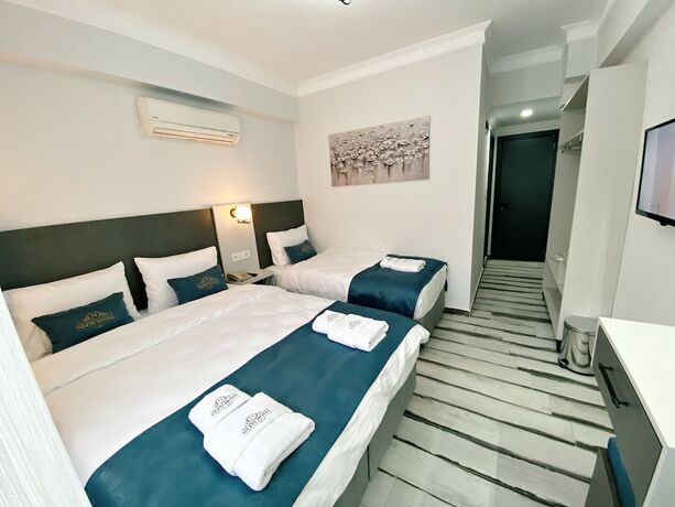 Imagen de la habitación del Nefis Hotel City. Foto 19
