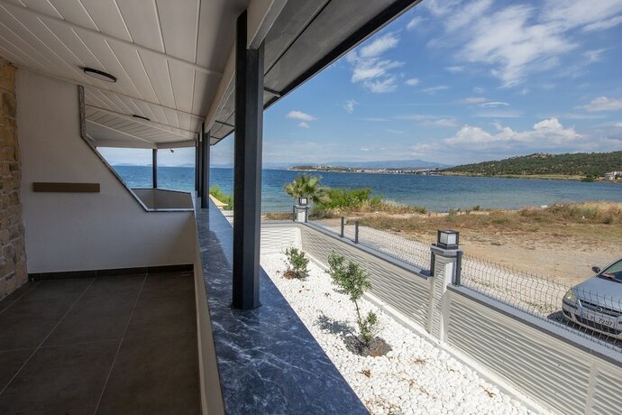 Imagen de la habitación del Neo Beach Hotel Cunda. Foto 11