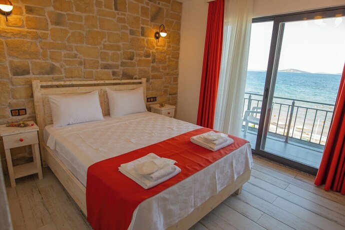 Imagen de la habitación del Neo Beach Hotel Cunda. Foto 13