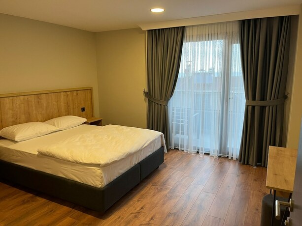 Imagen de la habitación del Neo Suite Hotel. Foto 19