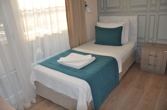 Imagen de la habitación del Neoss Boutique Hotel. Foto 11