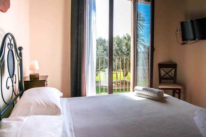 Imagen de la habitación del Neroli Bio Relais. Foto 12