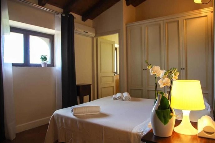 Imagen de la habitación del Neroli Bio Relais. Foto 13