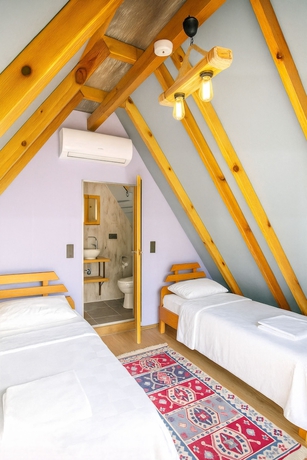 Imagen de la habitación del Nest Beach Bungalows Dat&ccedil;a. Foto 12