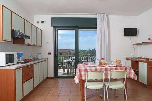 Imagen de la habitación del Nettuno Residence Hotel. Foto 8