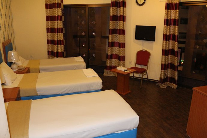 Imagen de la habitación del New Avon Hotel. Foto 8