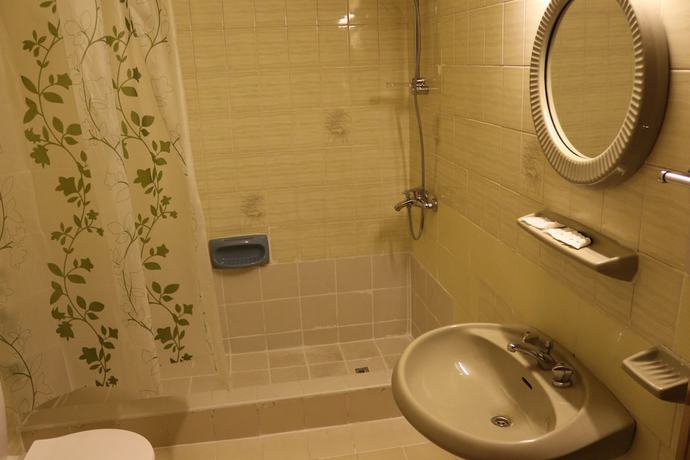 Imagen de la habitación del New Avon Hotel. Foto 13