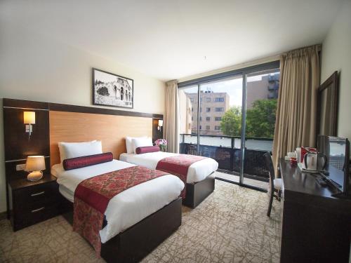 Imagen de la habitación del New Capitol Hotel. Foto 6
