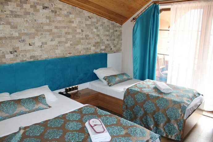 Imagen de la habitación del New Doga Resort Hotel. Foto 14