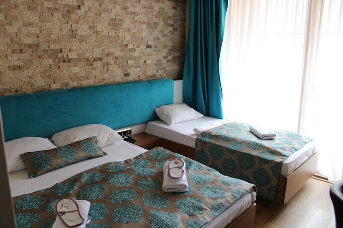 Imagen de la habitación del New Doga Resort Hotel. Foto 18