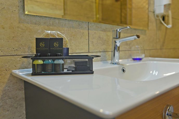 Imagen de la habitación del New Garden Hotel. Foto 1