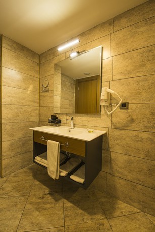 Imagen de la habitación del New Garden Hotel. Foto 2