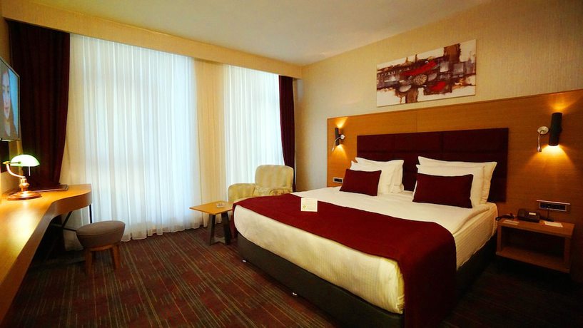 Imagen de la habitación del New Garden Hotel. Foto 10