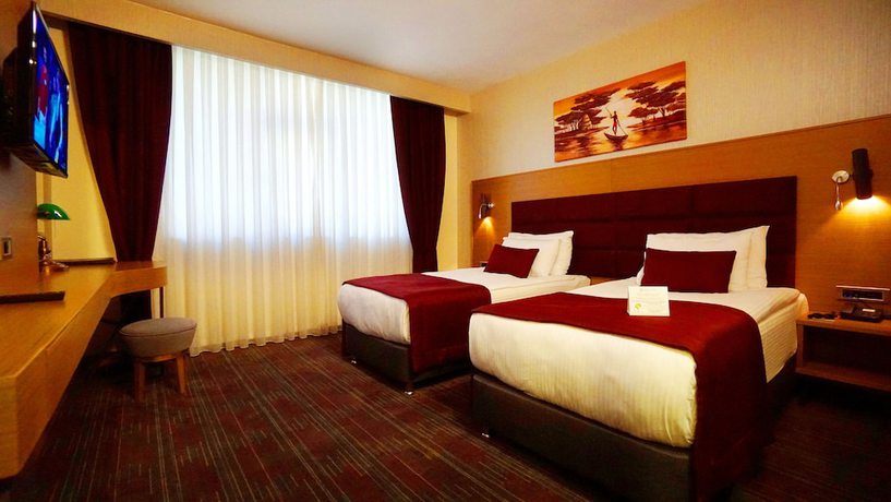 Imagen de la habitación del New Garden Hotel. Foto 12