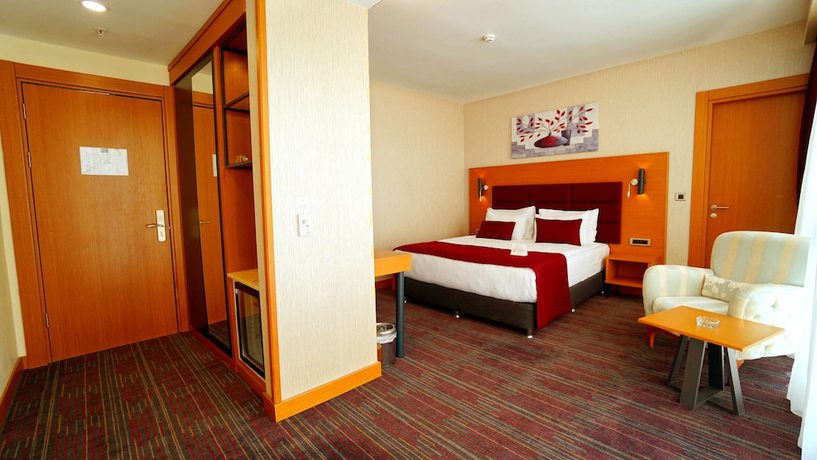 Imagen de la habitación del New Garden Hotel. Foto 13