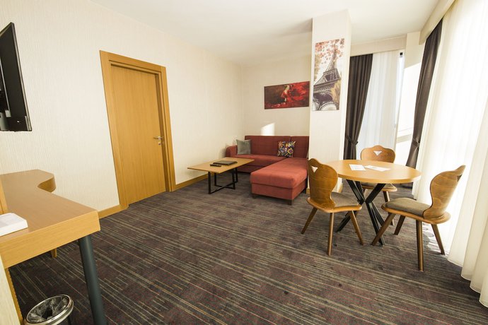 Imagen de la habitación del New Garden Hotel. Foto 19