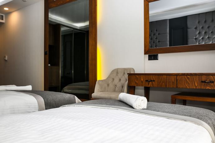 Imagen de la habitación del New Gate Hotel. Foto 5